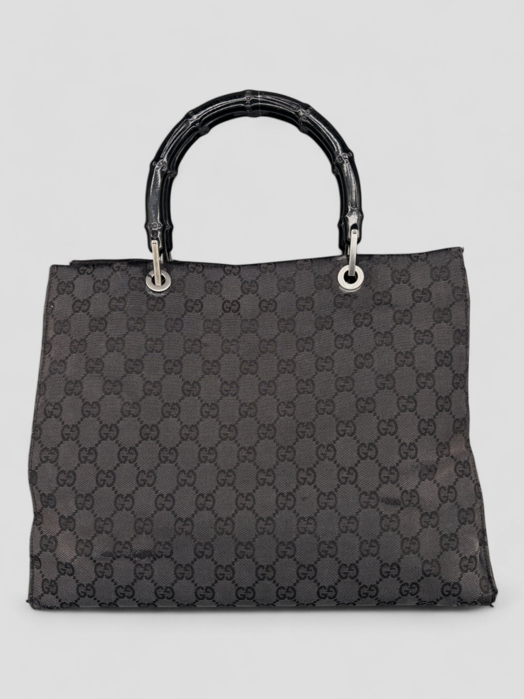 Gucci Bamboo Tasche aus GG-Canvas in Schwarz mit ikonischen Bambusgriffen und luxuriösem Design
