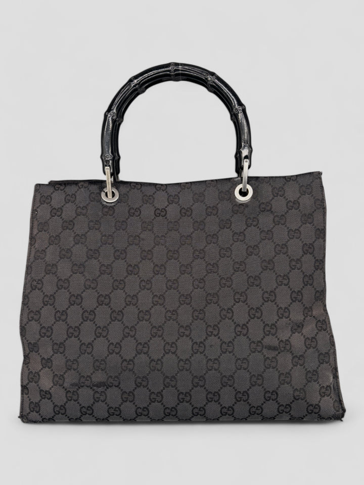 Gucci Bamboo Tasche aus GG-Canvas in Schwarz mit ikonischen Bambusgriffen und luxuriösem Design