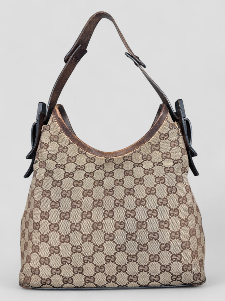 Gucci Hobo Tasche aus Monogramm-Canvas mit Holzapplikationen, eleganten Lederriemen und stilvollem Design