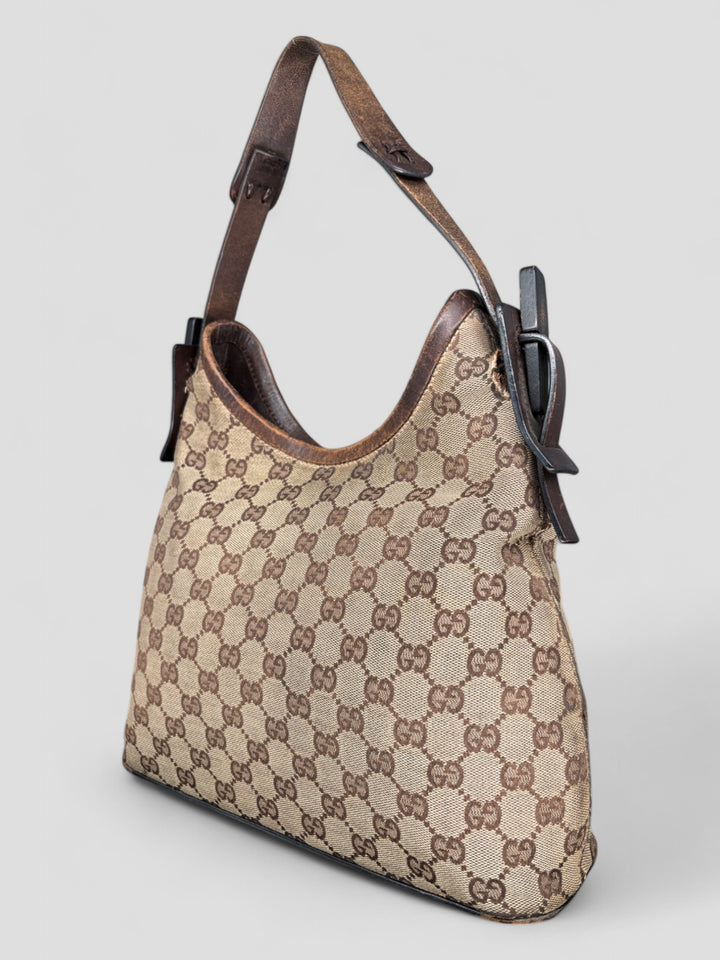Gucci Hobo Tasche aus Monogramm-Canvas mit Holzapplikationen, eleganten Lederriemen und stilvollem Design