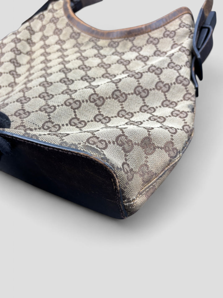 Gucci Hobo Tasche aus Monogramm-Canvas mit Holzapplikationen, eleganten Lederriemen und stilvollem Design