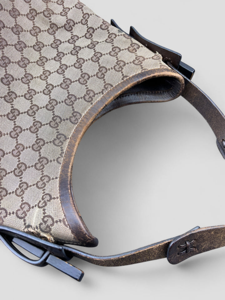 Gucci Hobo Tasche aus Monogramm-Canvas mit Holzapplikationen, eleganten Lederriemen und stilvollem Design