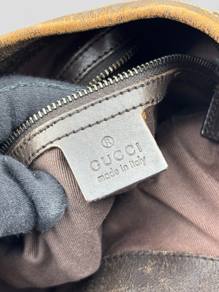 Gucci Hobo Tasche aus Monogramm-Canvas mit Holzapplikationen, eleganten Lederriemen und stilvollem Design