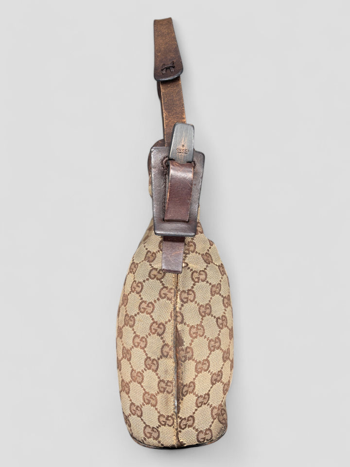 Gucci Hobo Tasche aus Monogramm-Canvas mit Holzapplikationen, eleganten Lederriemen und stilvollem Design