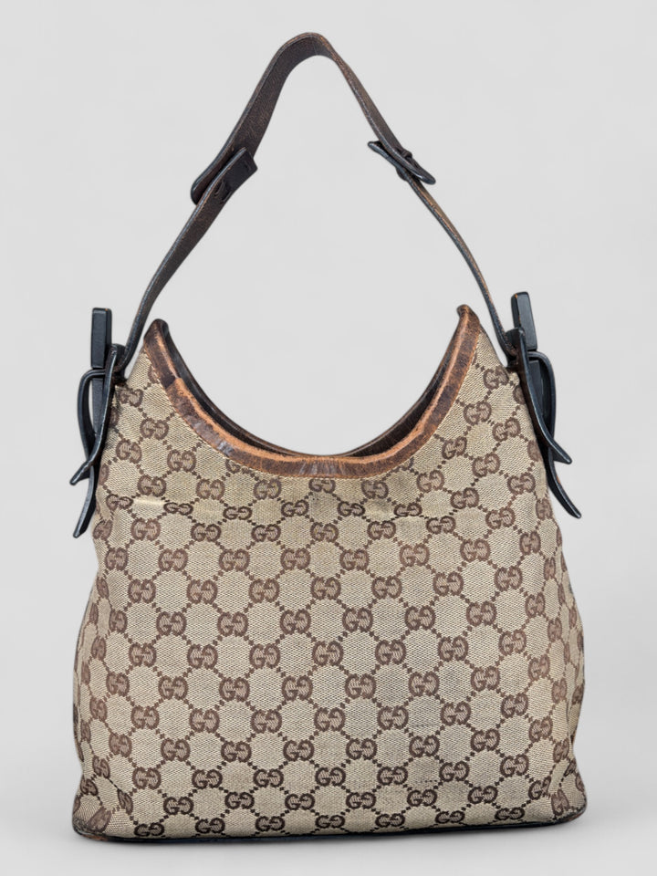 Gucci Hobo Tasche aus Monogramm-Canvas mit Holzapplikationen, eleganten Lederriemen und stilvollem Design