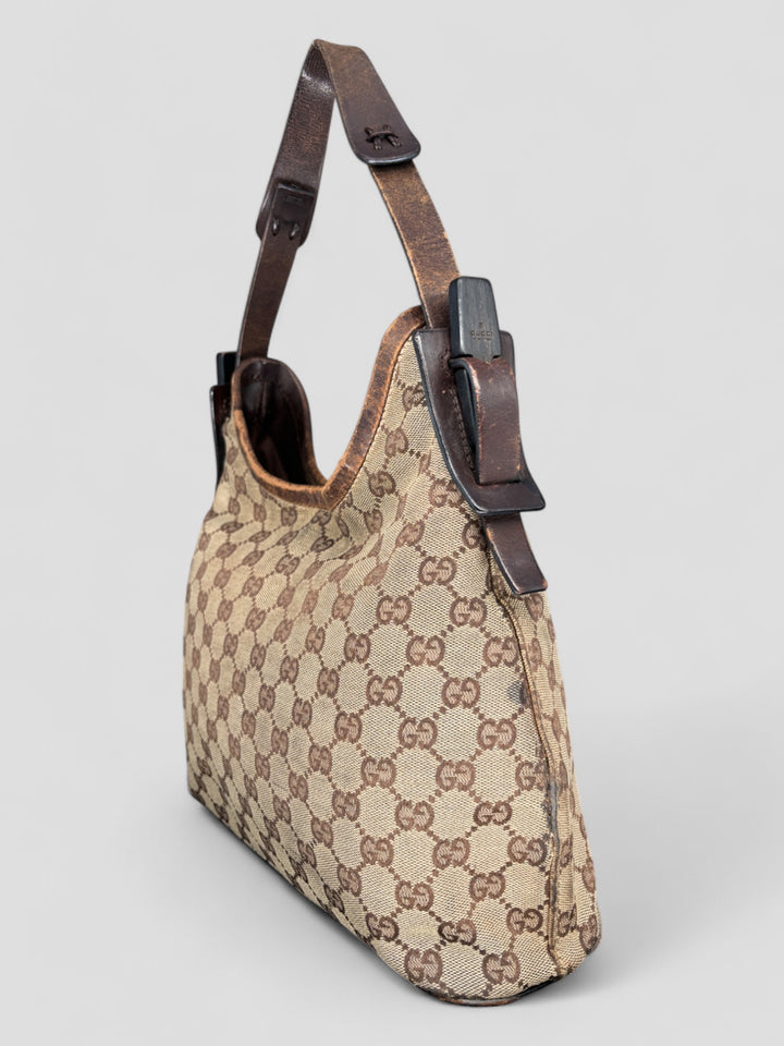Gucci Hobo Tasche aus Monogramm-Canvas mit Holzapplikationen, eleganten Lederriemen und stilvollem Design
