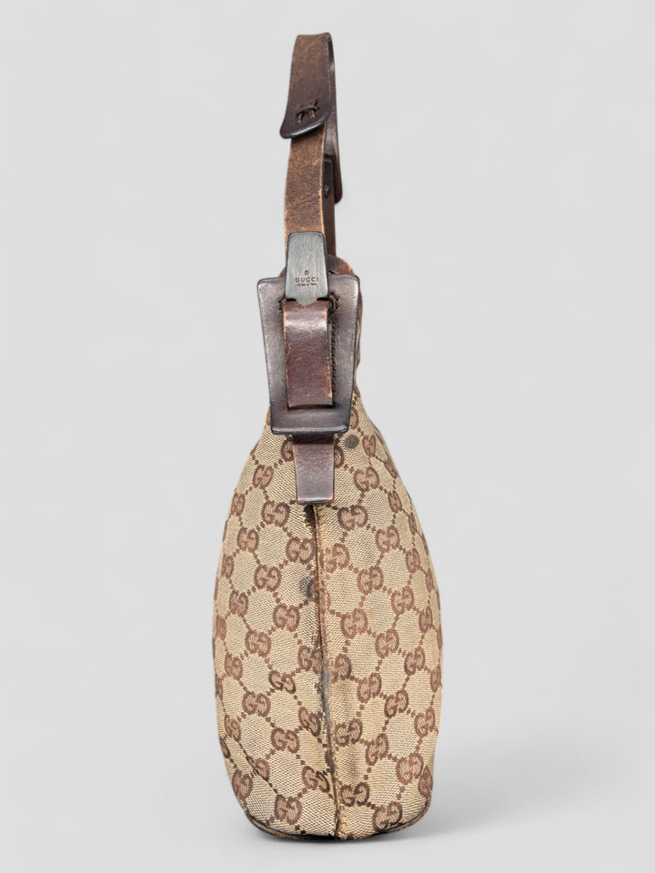 Gucci Hobo Tasche aus Monogramm-Canvas mit Holzapplikationen, eleganten Lederriemen und stilvollem Design