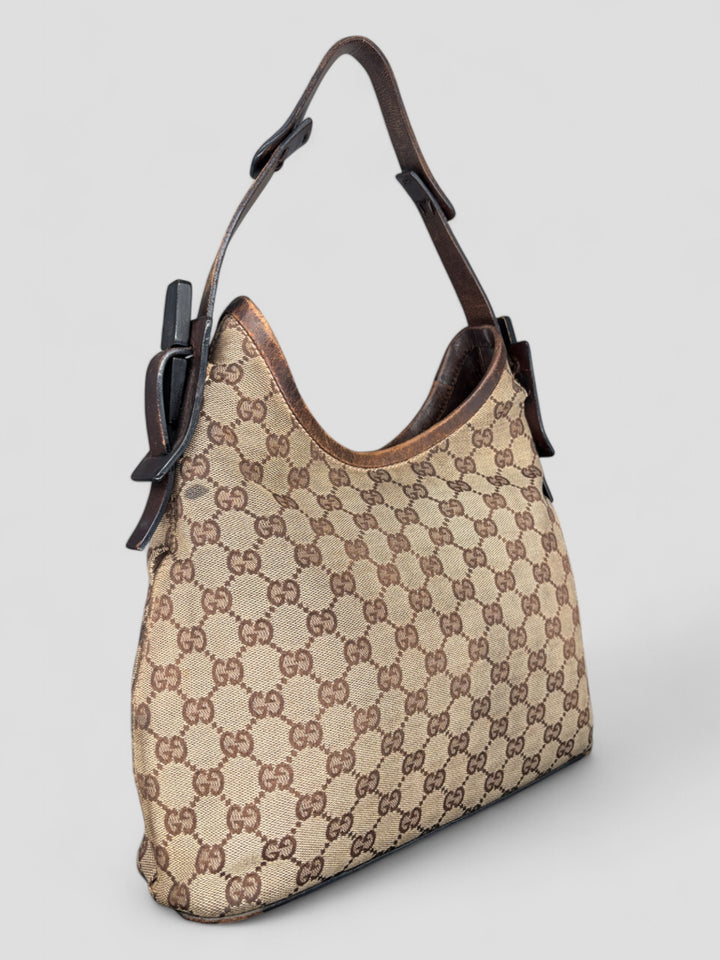 Gucci Hobo Tasche aus Monogramm-Canvas mit Holzapplikationen, eleganten Lederriemen und stilvollem Design