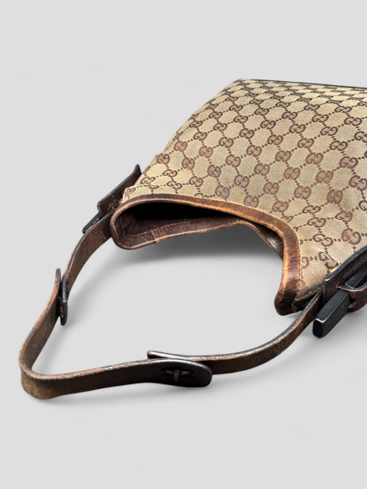 Gucci Hobo Tasche aus Monogramm-Canvas mit Holzapplikationen, eleganten Lederriemen und stilvollem Design