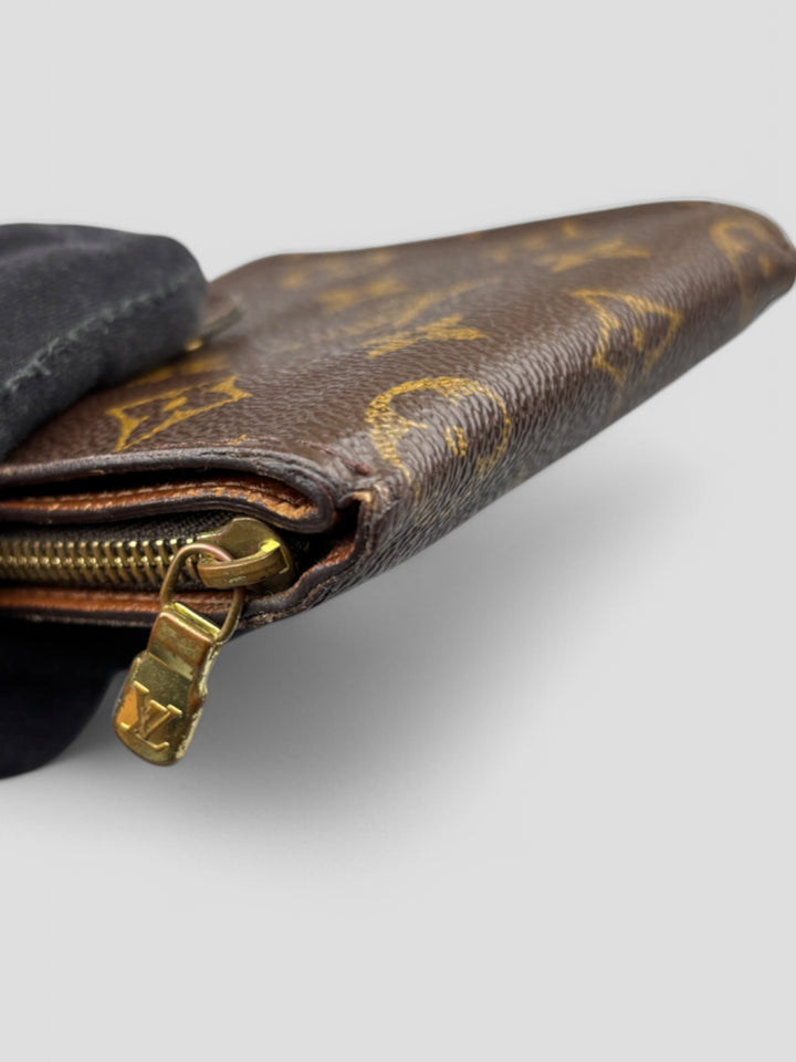 Louis Vuitton Compact Zip Portemonnaie in Monogram Canvas mit Reißverschluss, Druckknopf und durchdachter Innenaufteilung für Karten, Münzen und Geldscheine