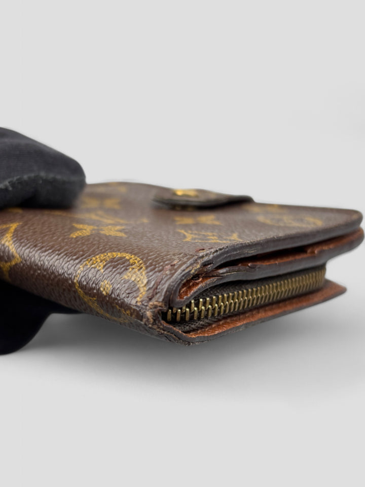 Louis Vuitton Compact Zip Portemonnaie in Monogram Canvas mit Reißverschluss, Druckknopf und durchdachter Innenaufteilung für Karten, Münzen und Geldscheine