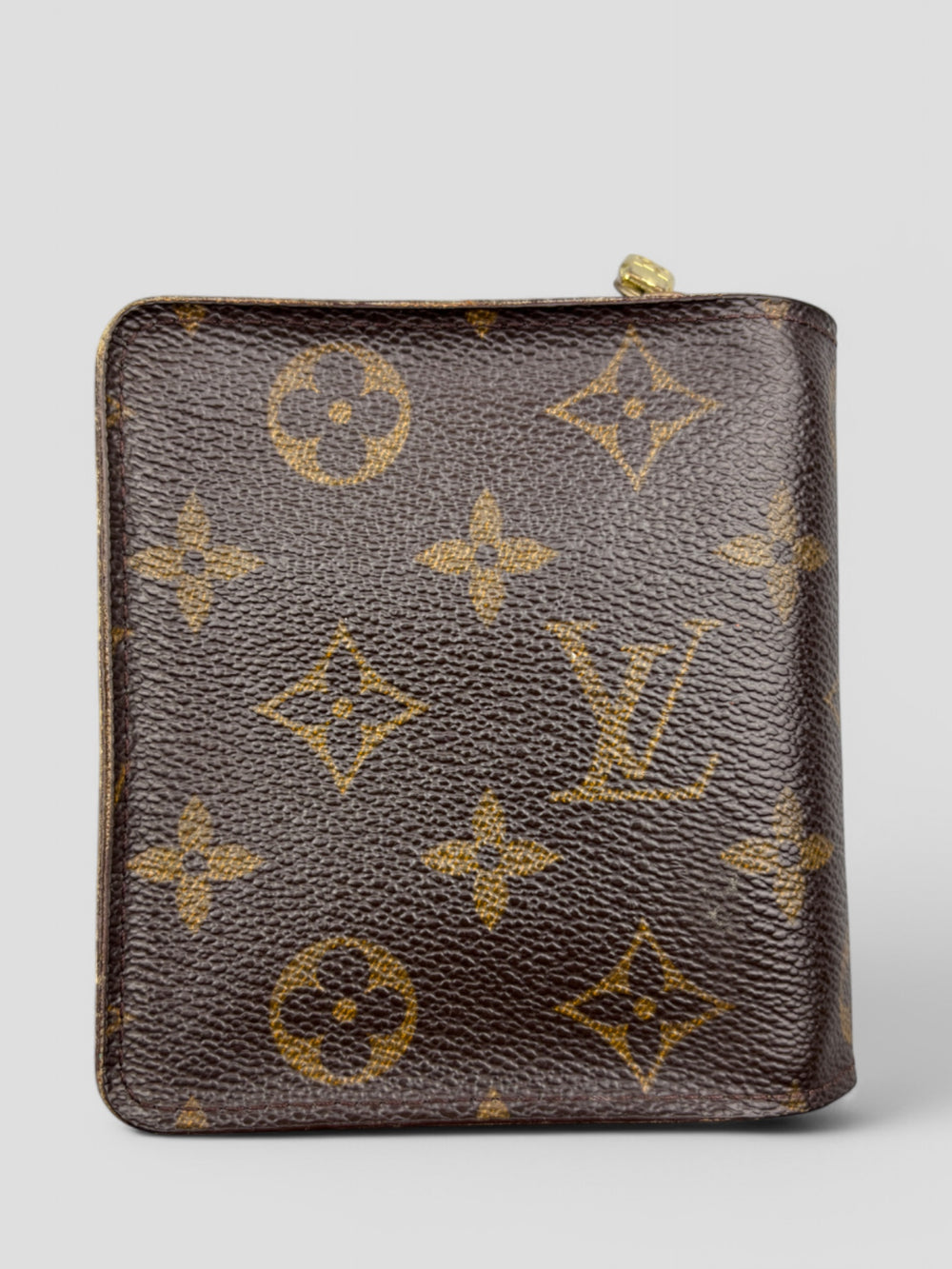 Louis Vuitton Geldbeutel im ikonischen Monogram Canvas mit Druckknopflasche und durchdachtem Innenraum für Karten und Münzen