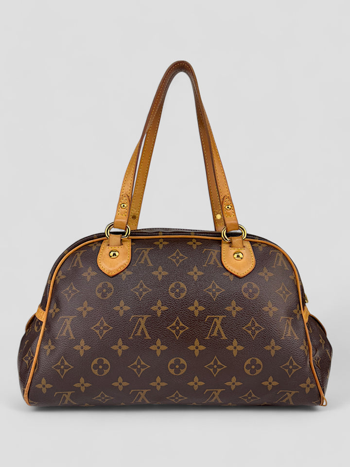 Louis Vuitton Montorgueil Schultertasche aus braunem Monogram Canvas mit cognacfarbenen Lederdetails, goldfarbenen Beschlägen und Louis Vuitton Gravur. Feminin und geräumig