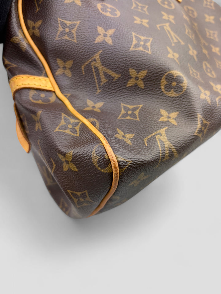 Louis Vuitton Montorgueil Schultertasche aus braunem Monogram Canvas mit cognacfarbenen Lederdetails, goldfarbenen Beschlägen und Louis Vuitton Gravur. Feminin und geräumig