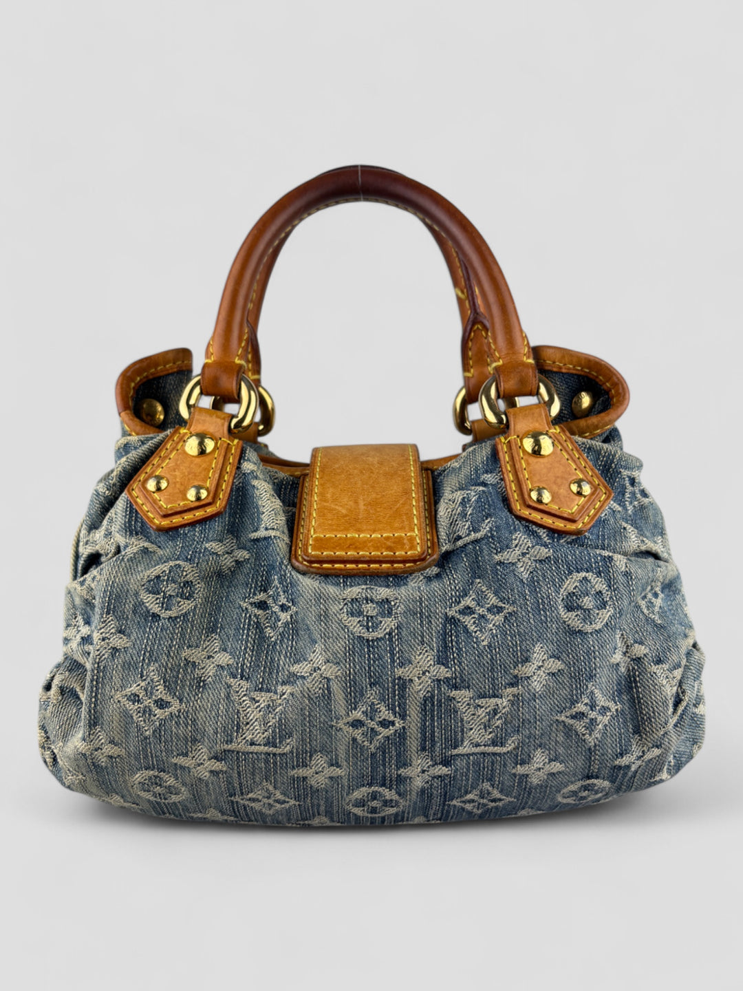 Louis Vuitton Pleaty Denim Handbag aus Monogramm-Denim mit Lederdetails und goldfarbener Schließe, Innenfutter in Gelb