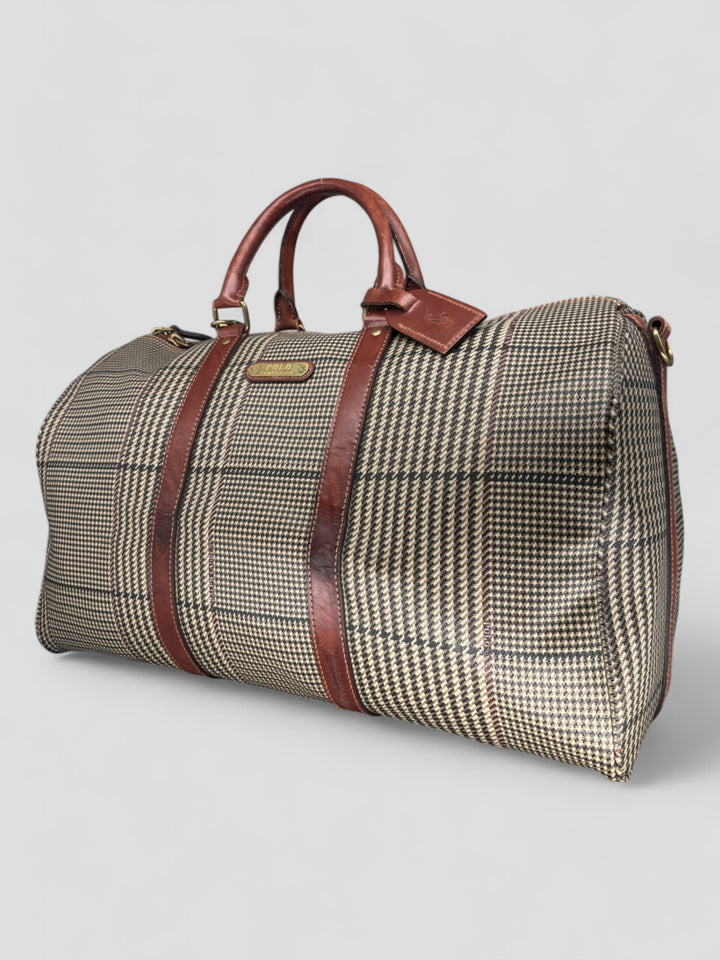Ralph Lauren Reisetasche mit klassischem Karomuster, braunen Lederdetails und goldfarbenen Akzenten