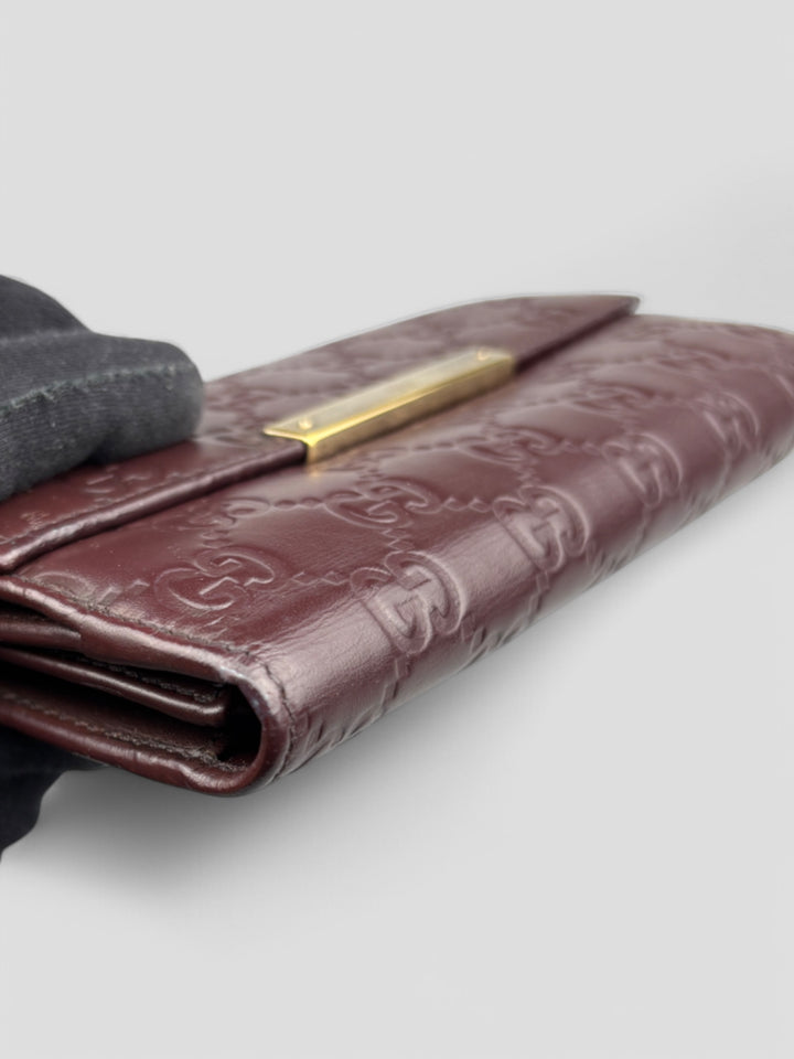 Vintage Gucci Unisex Leder Geldbeutel Braun Monogram Goldene Akzente, Second-Hand Gucci Wallet Brown Monogram Gold Details
