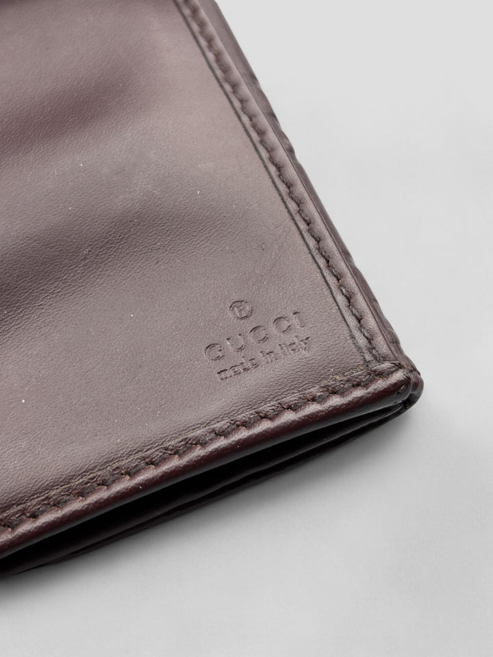 Vintage Gucci Unisex Leder Geldbeutel Braun Monogram Goldene Akzente, Second-Hand Gucci Wallet Brown Monogram Gold Details